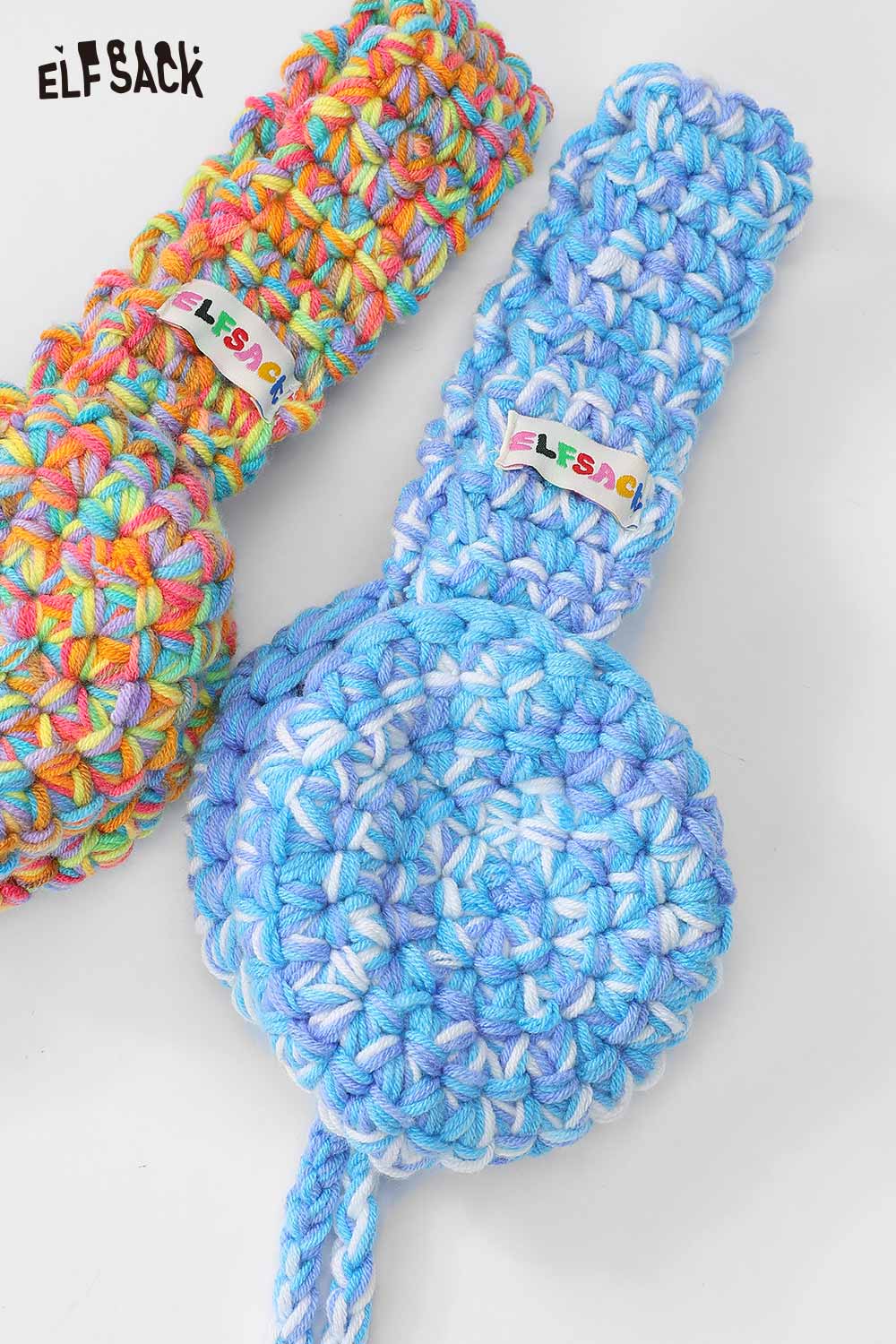 Colorful ELFSACK hand-knitted ear warmers in vibrant blue and multi-color designs for stylish winter warmth