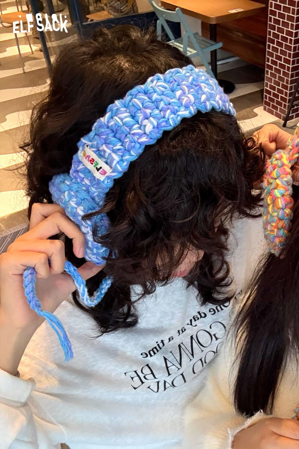 ELFSACK hand-knitted ear warmers in blue, perfect for winter fashion and keeping warm