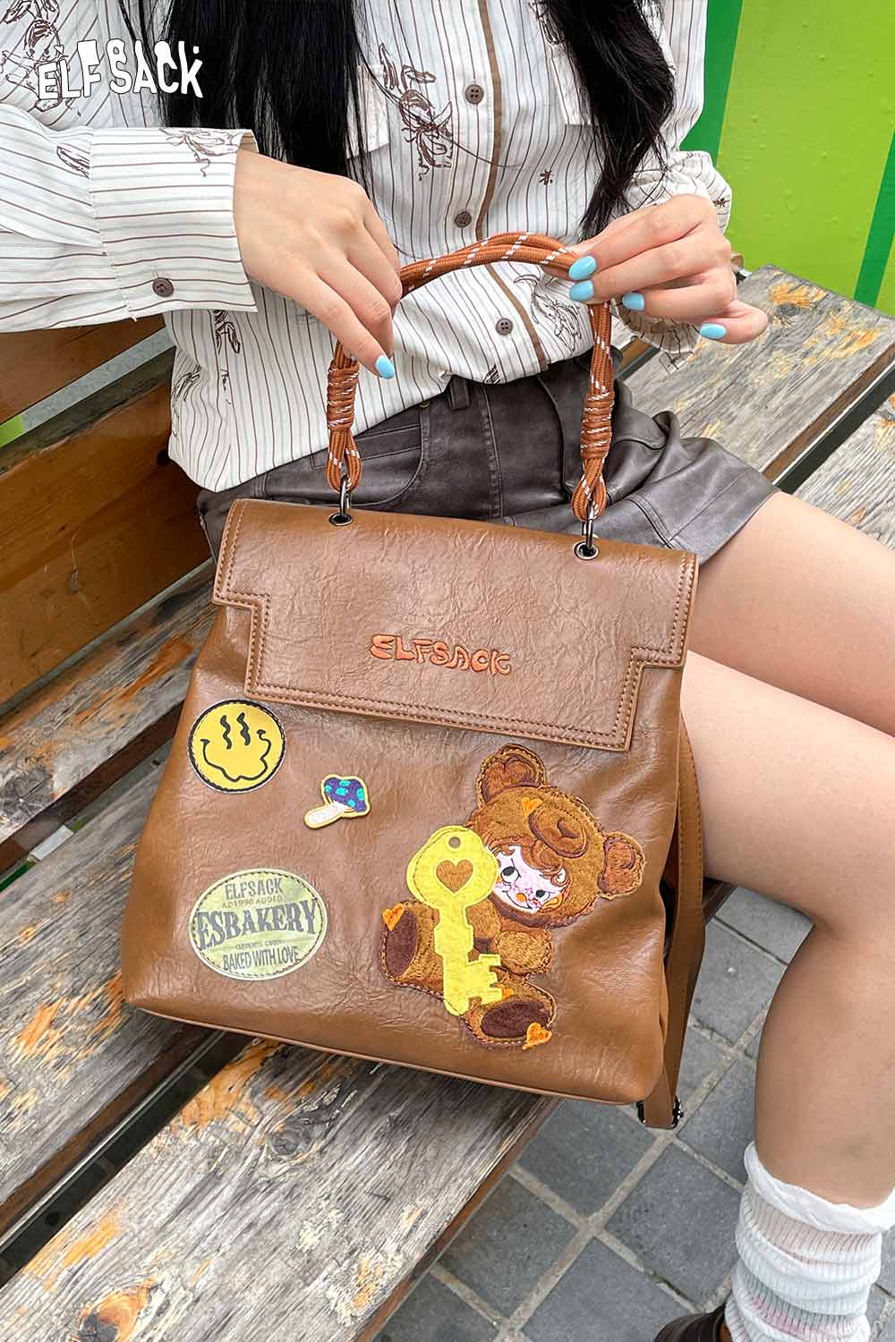 ELFSACK playful embroidery PU leather backpack with cute patches and a stylish handle