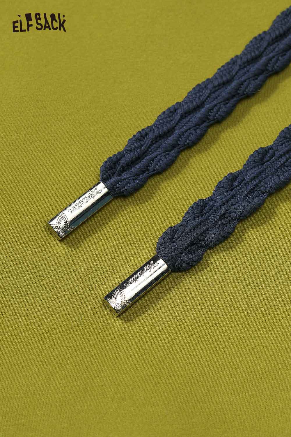Close-up of the navy drawstrings on an ELFSACK sleeping dog graphic hoodie
