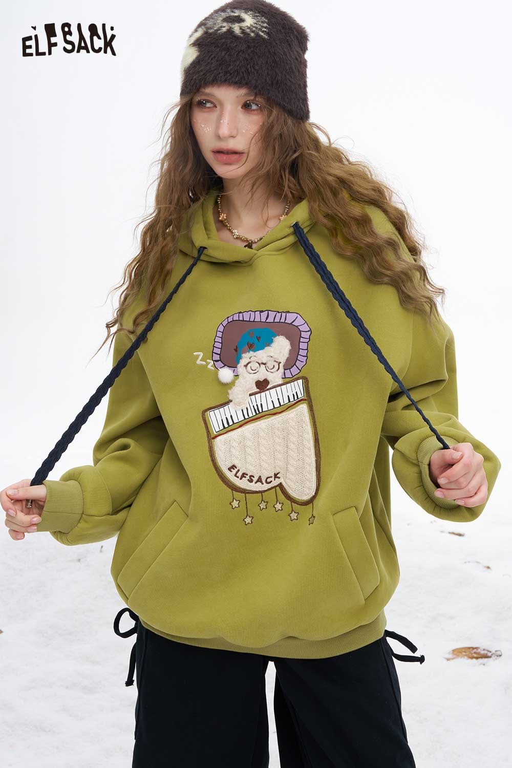 ELFSACK sleeping dog graphic hoodie in green featuring a playful dog design for cozy wear