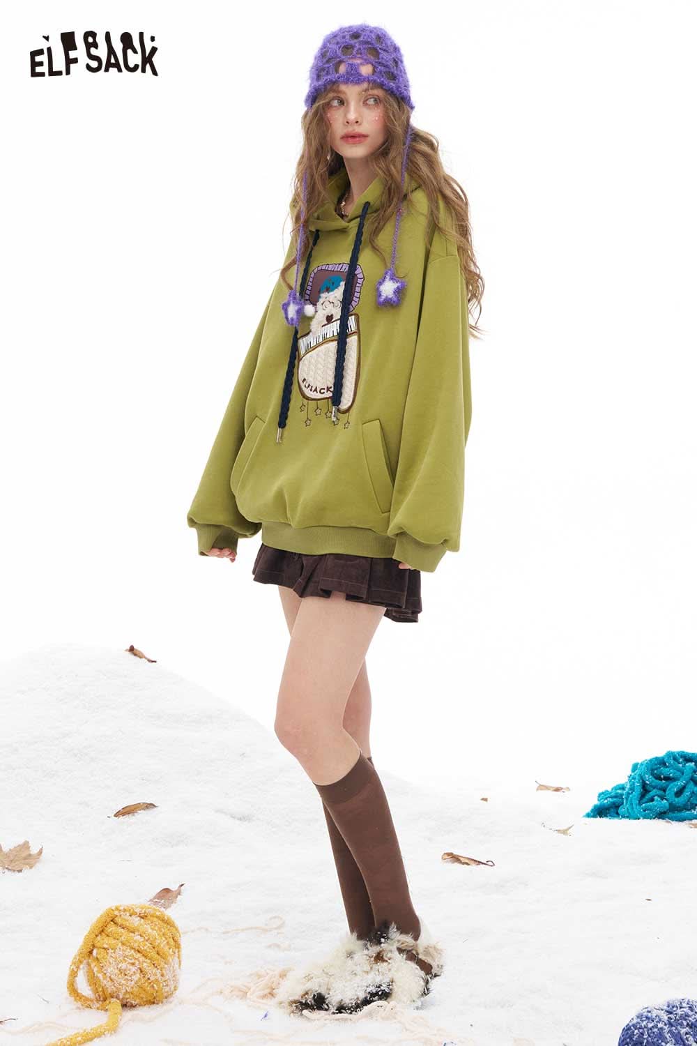 ELFSACK sleeping dog graphic hoodie in green with oversized fit and playful design