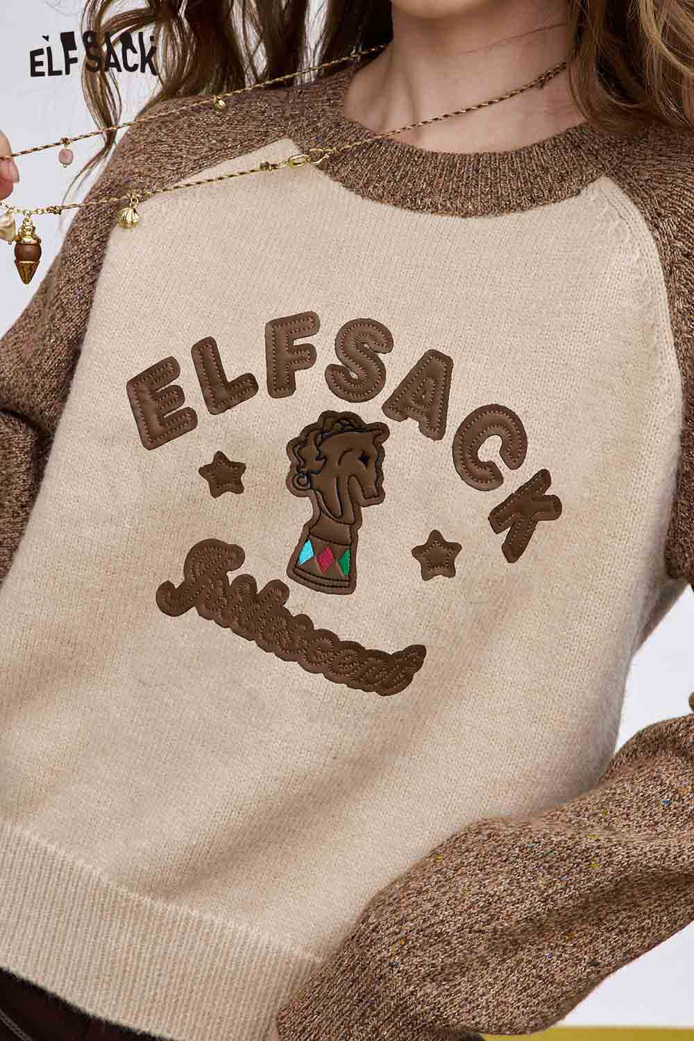 ELFSACK soft graphic knit sweater with a unique logo design and contrasting sleeves for a stylish look