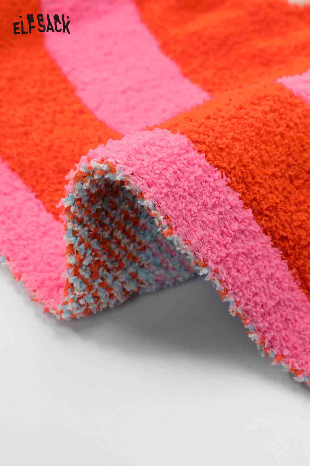 ELFSACK Striped Color Block Home Blanket in vibrant pink, orange, and blue for cozy relaxation