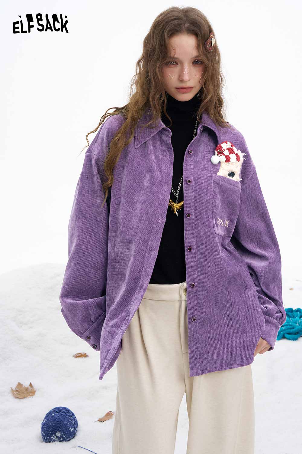 ELFSACK women's animal graphic shirt in purple with playful design on the pocket for a trendy look