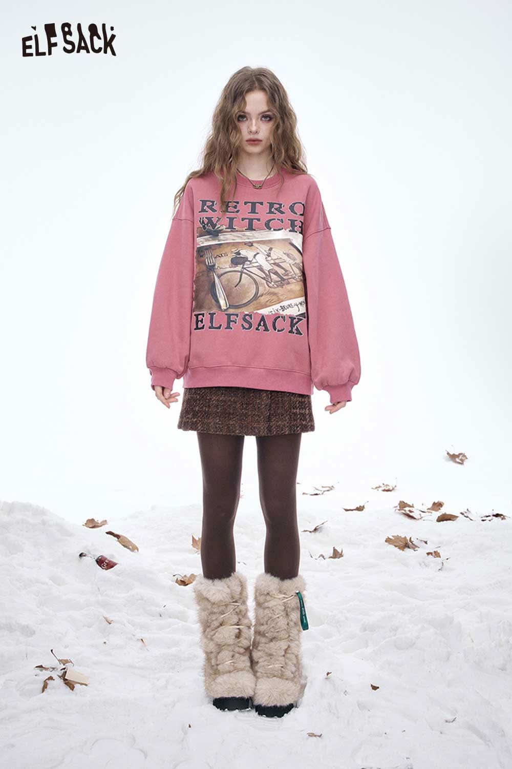 ELFSACK women's letter graphic sweatshirt in pink with retro witch design, paired with a skirt and winter boots