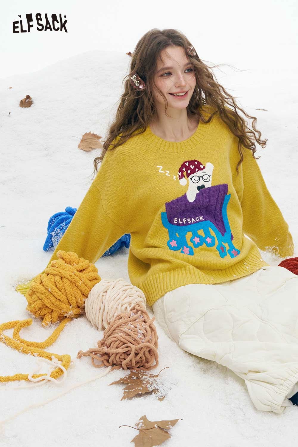 ELFSACK women's sleeping dog graphic sweater in yellow with playful design for cozy wear