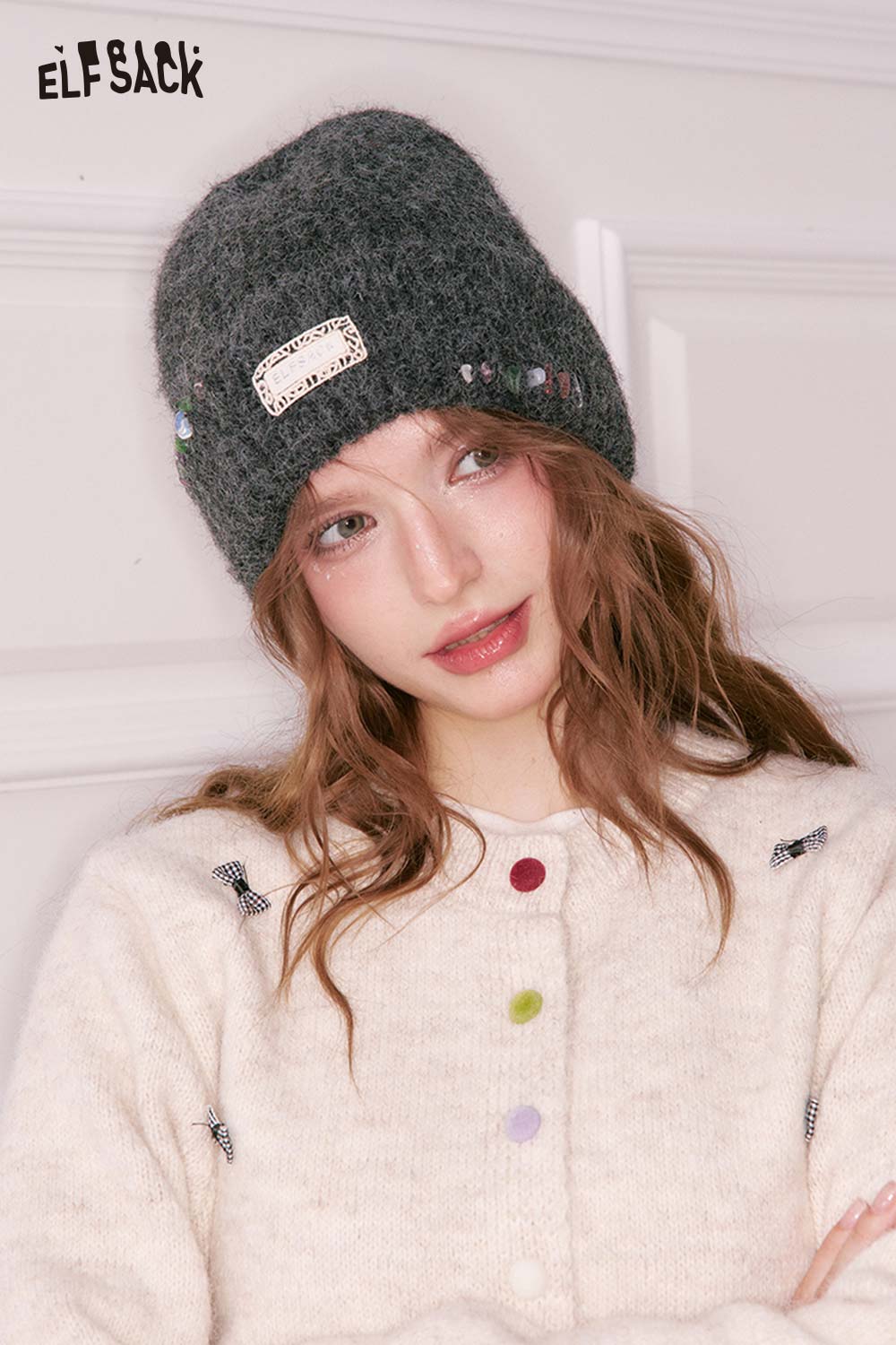 ELFSACK women's solid color beanie with decorative embellishments for a stylish winter look