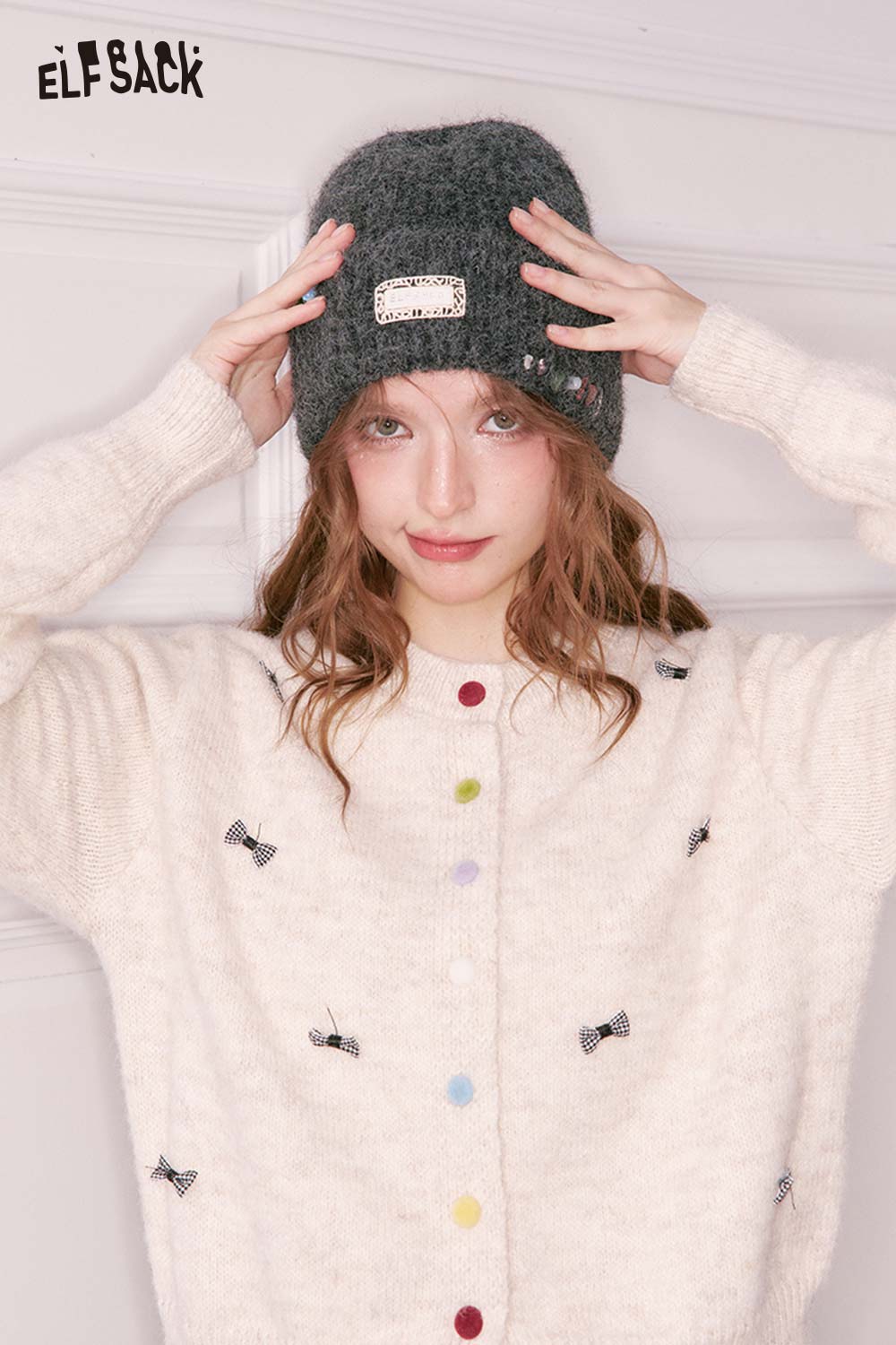 ELFSACK women's solid color beanie in dark grey styled with a cozy cardigan for winter fashion