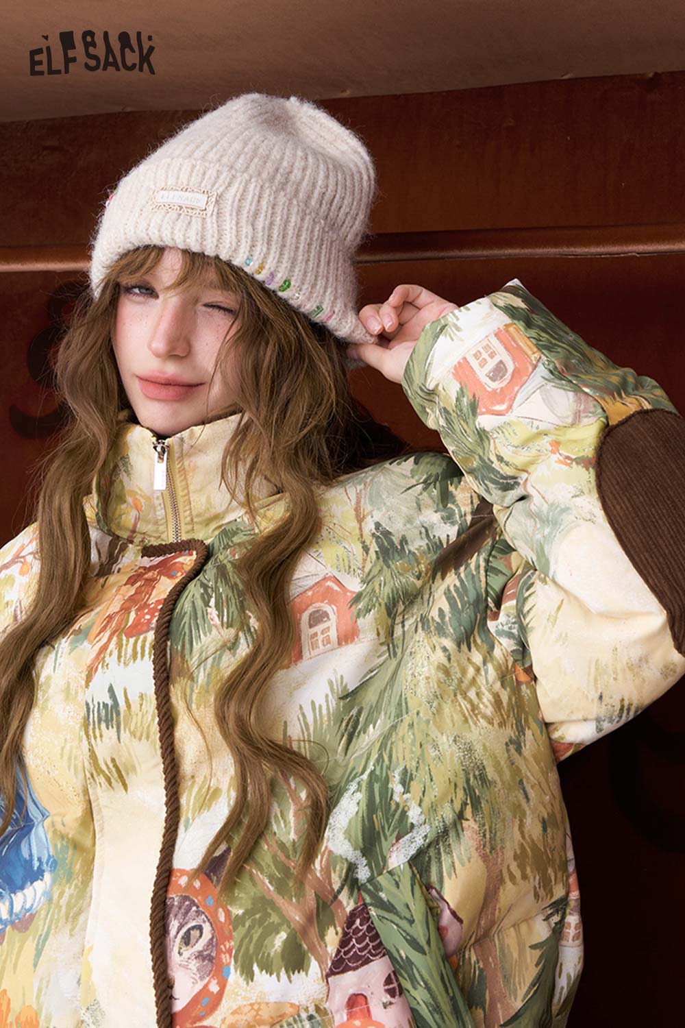 ELFSACK women's solid color beanie paired with a colorful winter jacket for a stylish look