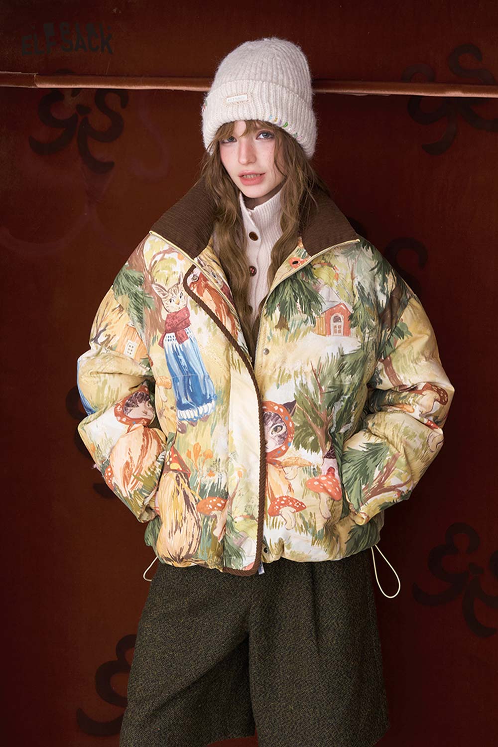 ELFSACK women's solid color beanie paired with a colorful oversized jacket for a trendy winter look