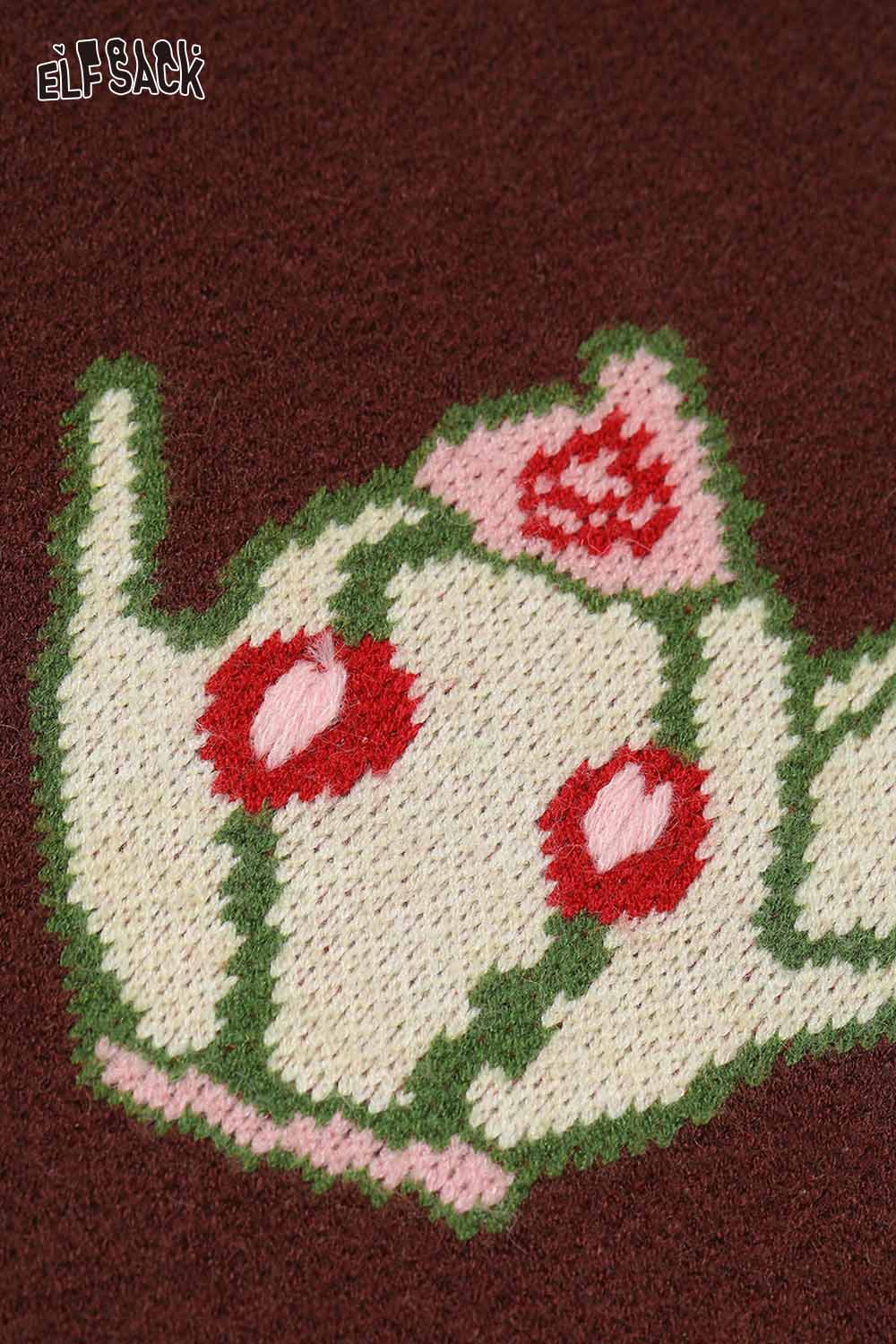 Close-up of ELFSACK fake two piece long dress featuring intricate floral embroidery details