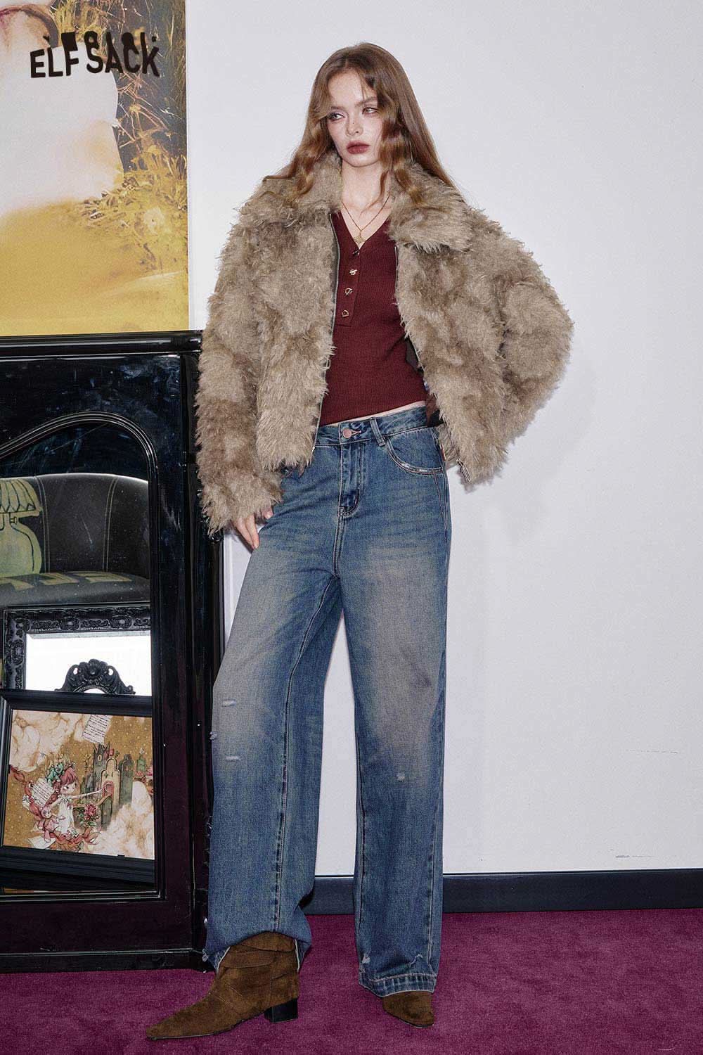 ELFSACK faux fur ombre cropped jacket styled with a burgundy top and wide-leg jeans against a colorful backdrop