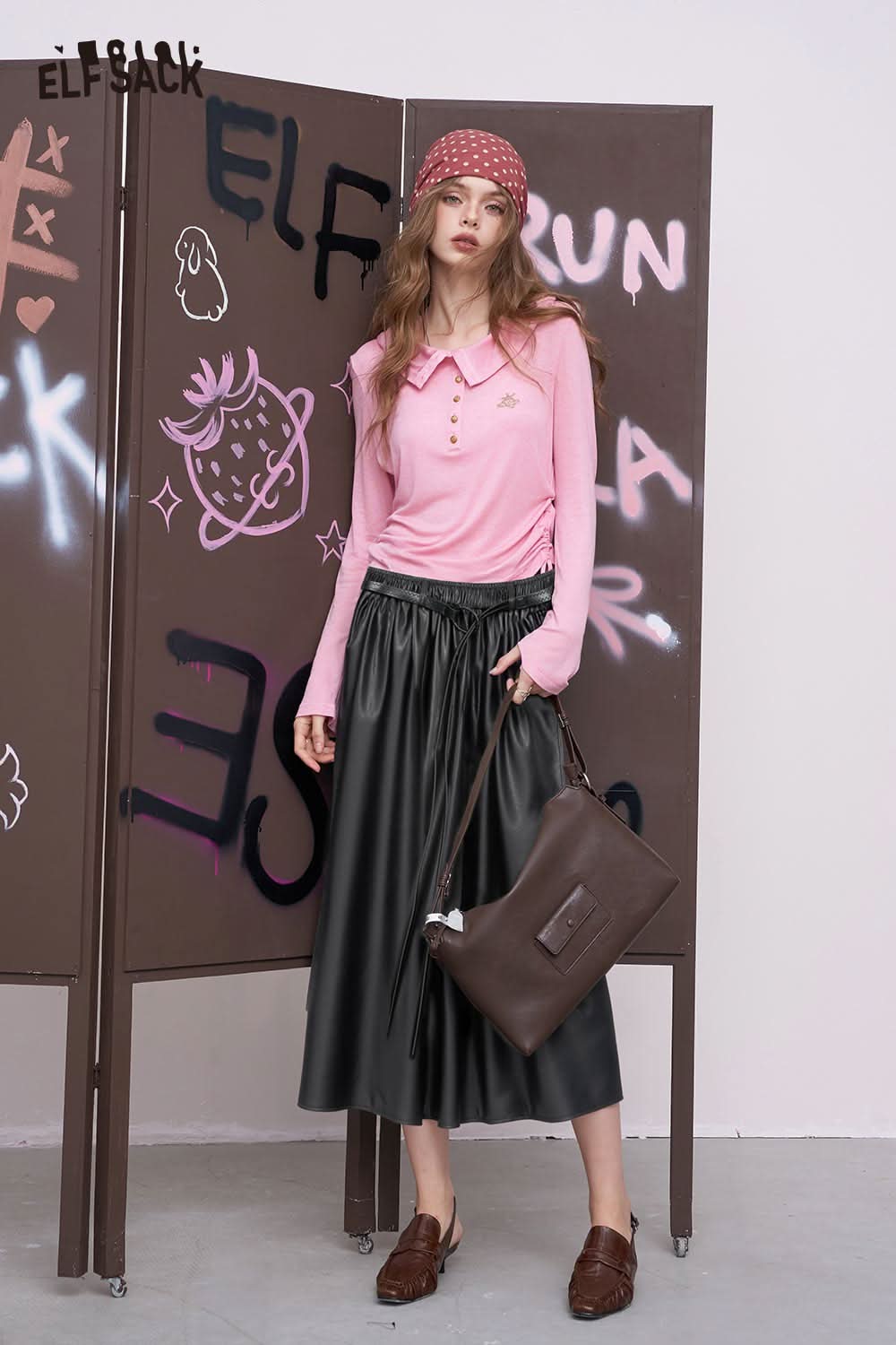 ELFSACK faux leather maxi skirt styled with a pink top, perfect for trendy casual wear