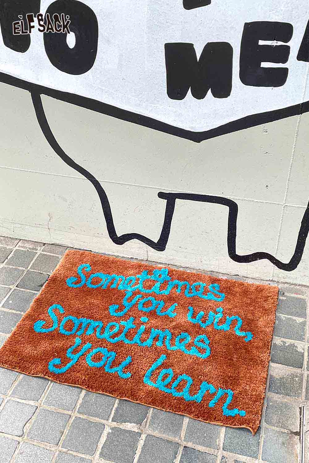 ELFSACK felted wool rug with typography featuring the quote Sometimes you win, sometimes you learn