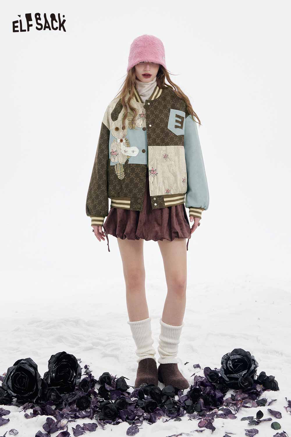 ELFSACK floral animal patchwork coat women displayed on a model with a trendy outfit in a floral setting