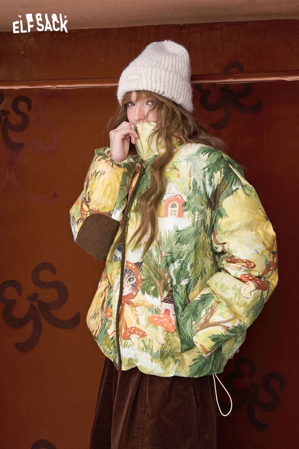 ELFSACK forest animal graphic down jacket featuring colorful woodland prints and a cozy fit