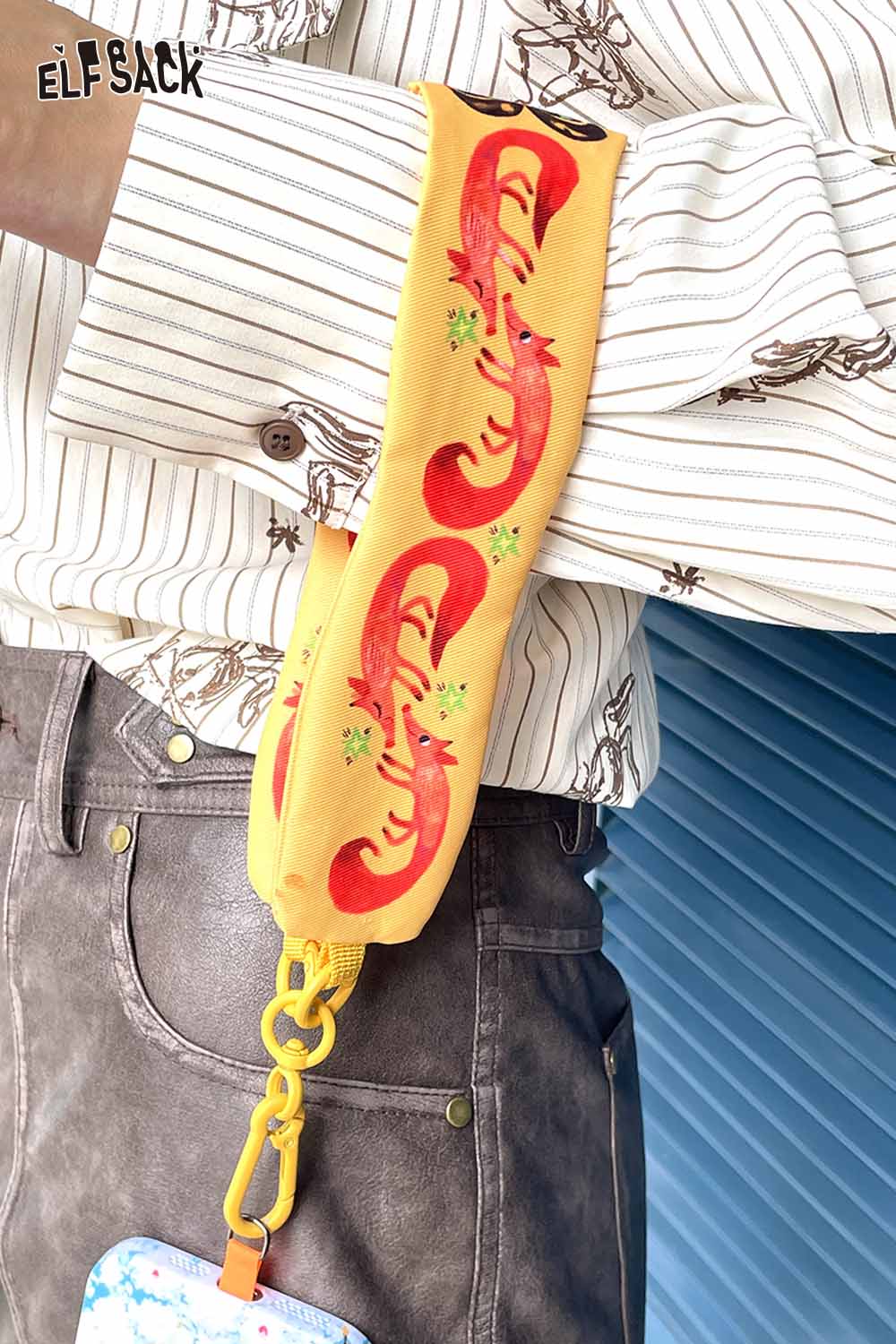 ELFSACK fox character phone strap in bright yellow with red fox designs for stylish accessories