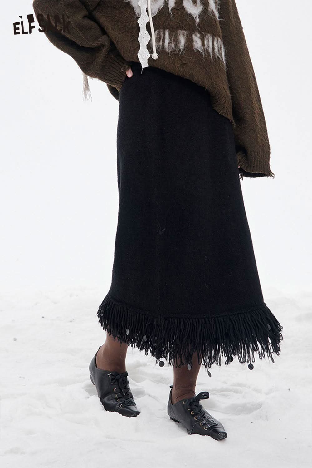 ELFSACK fringe hem long skirt in black with stylish fringe detailing at the bottom
