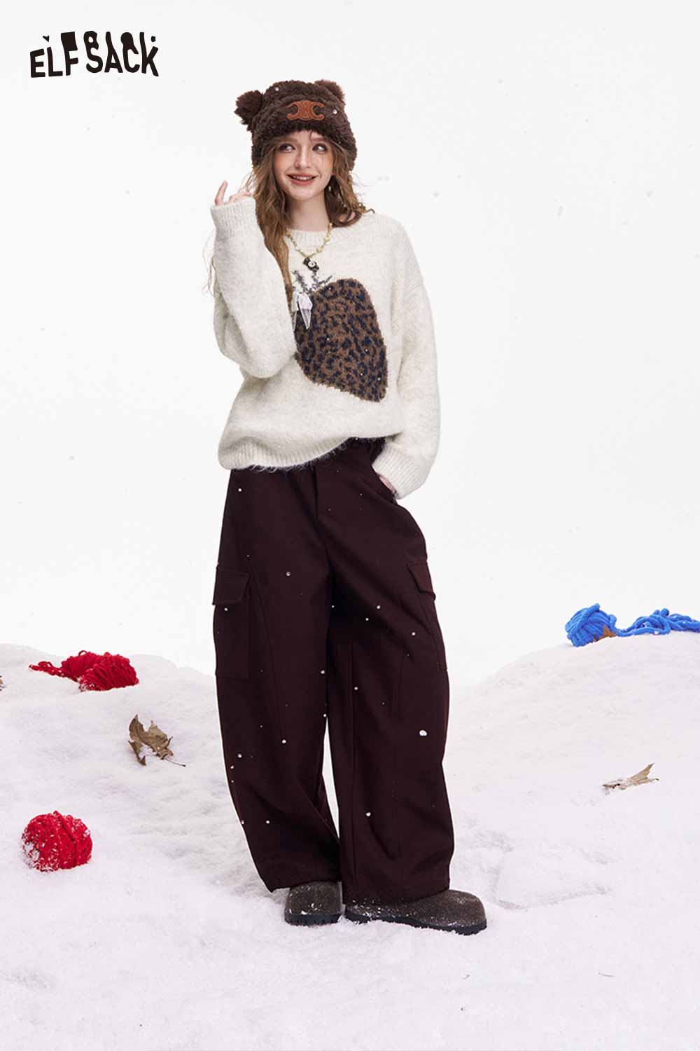 Cozy ELFSACK fruit graphic sweater for women in cream with a fun leopard design and casual styling