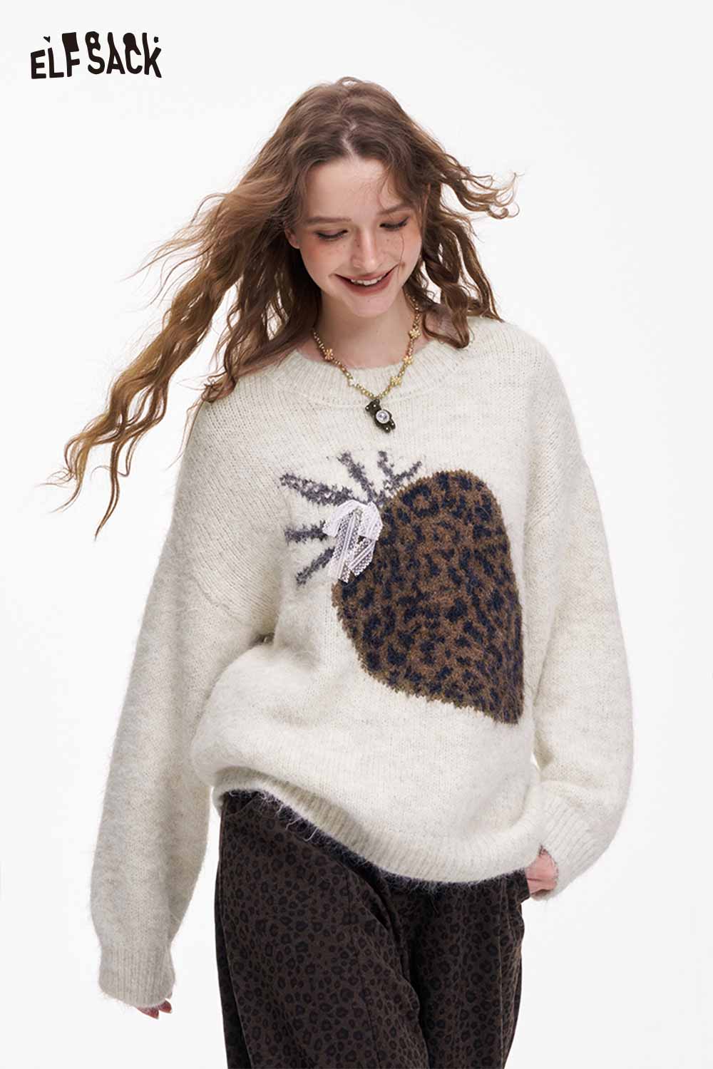 Cozy ELFSACK fruit graphic sweater for women featuring a playful pineapple design on a soft fabric