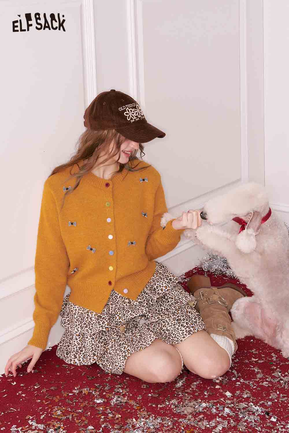 ELFSACK girly bow cardigan in mustard yellow with cute bow details and button closure