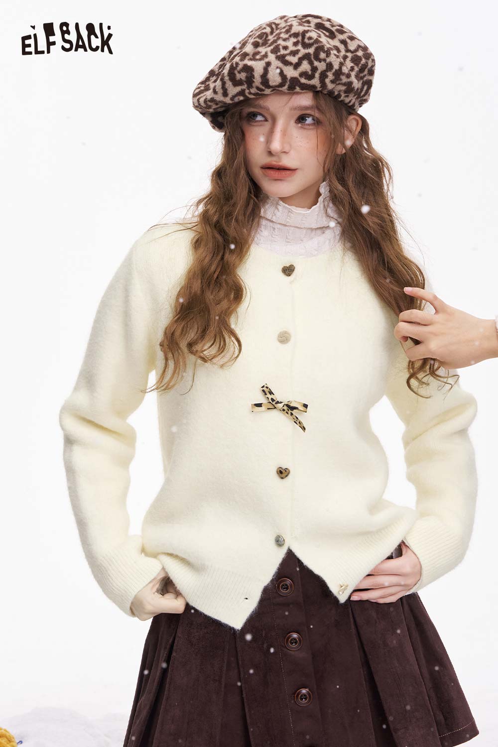 ELFSACK girly leopard bow cardigan in cream with heart button details styled with a brown skirt