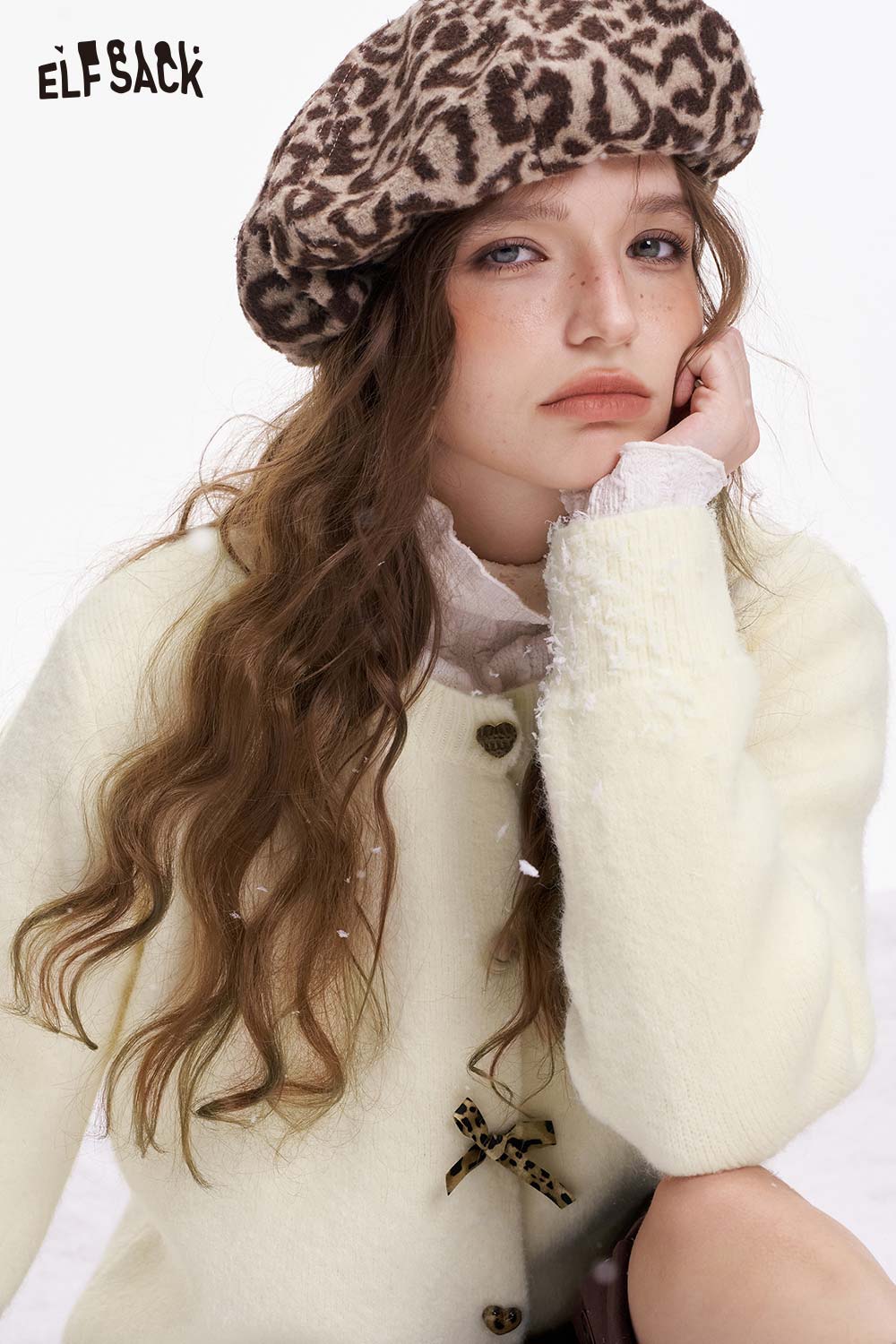 ELFSACK girly leopard bow cardigan in soft cream with decorative bow and cozy style