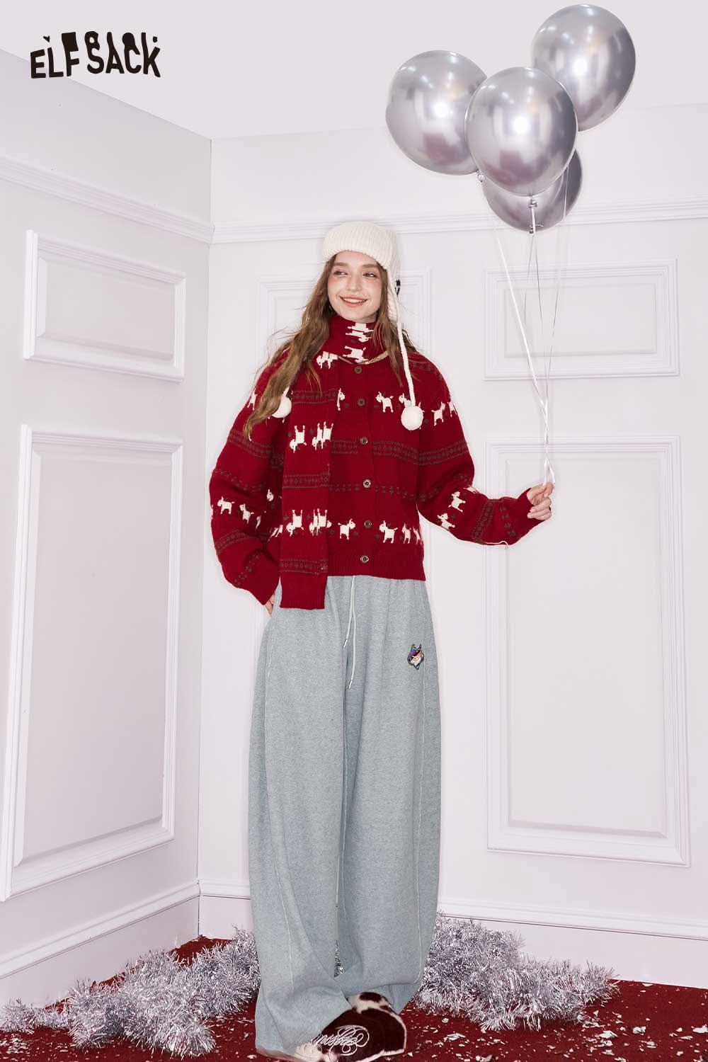 ELFSACK heart embroidery wide leg pants in light grey paired with a red festive sweater