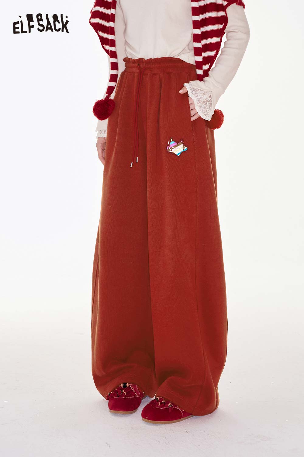 ELFSACK heart embroidery wide leg pants in rust color with a comfortable fit and playful design