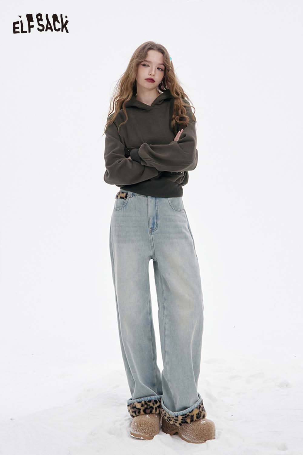 ELFSACK heart patchwork hooded sweatshirt in olive green, styled with loose-fitting jeans for a trendy look