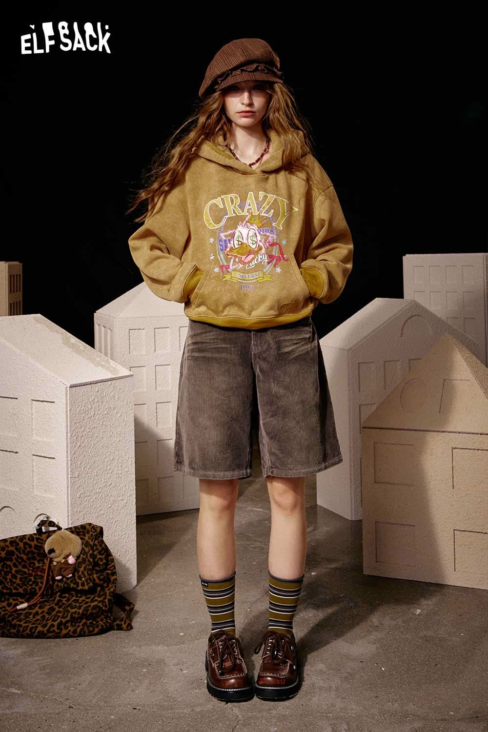 ELFSACK high waist mid shorts for women styled with a casual hoodie and accessories