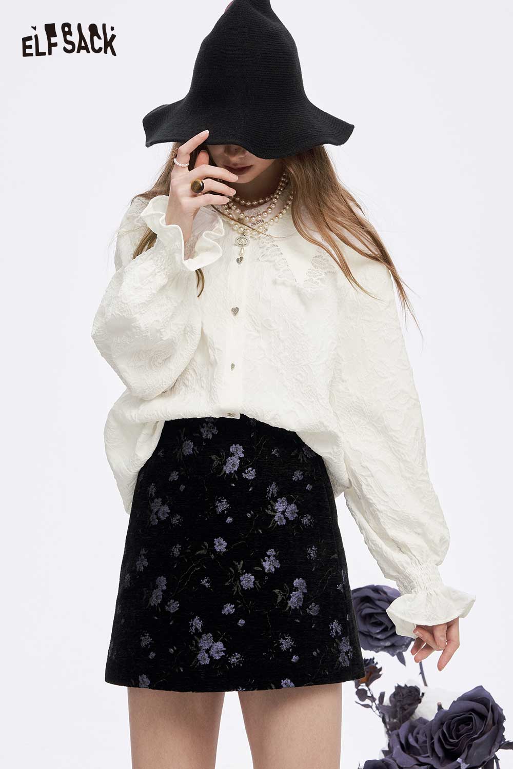 ELFSACK lace lapel collar ruffled cuff shirt in white, styled with a floral skirt and hat