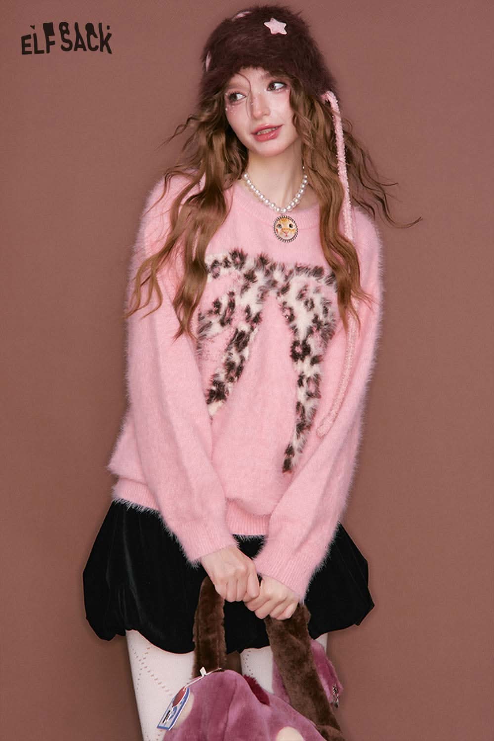 ELFSACK pink leopard bow graphic sweater in soft fabric, perfect for casual outfits