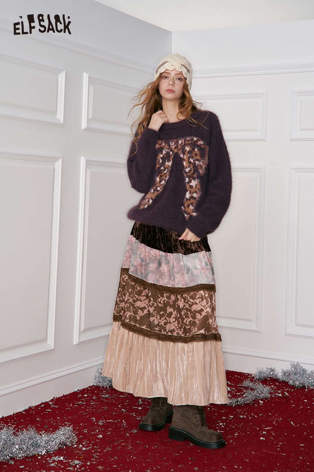 ELFSACK leopard bow graphic sweater in purple worn with a layered skirt for a stylish look