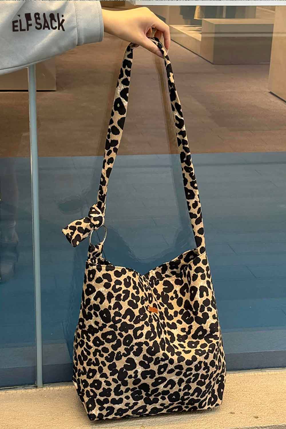 Leopard print crossbody bag from ELFSACK featuring a stylish and versatile design