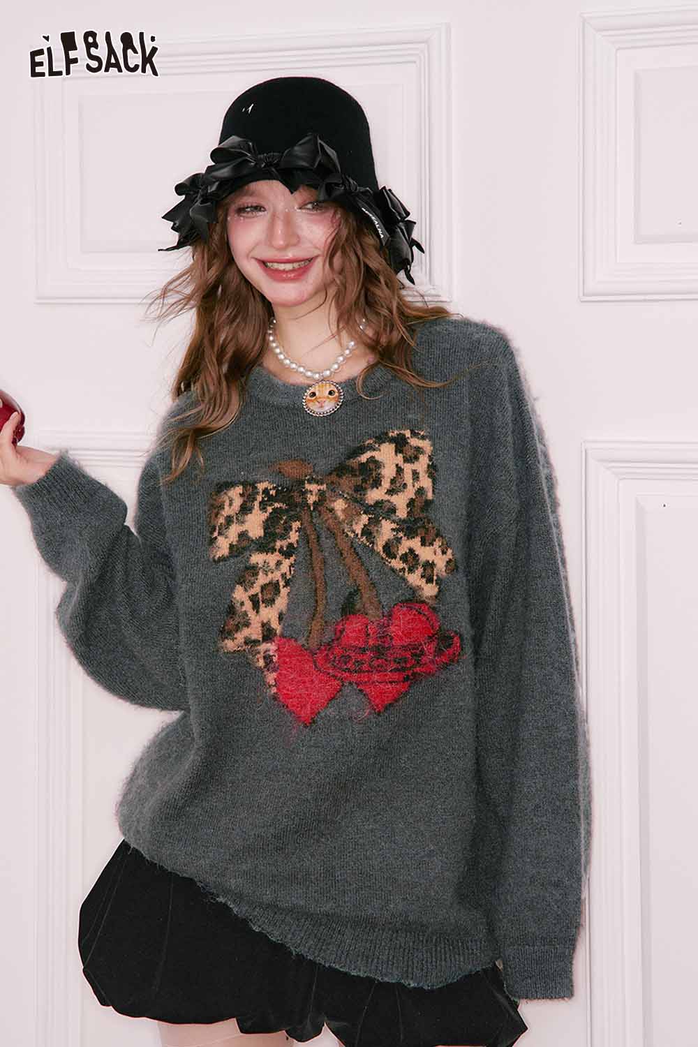 ELFSACK leopard print graphic sweater in gray with bow design and a relaxed fit for stylish comfort