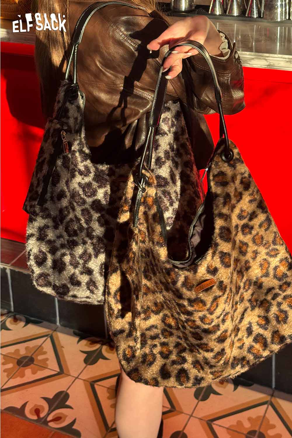 ELFSACK leopard print tote bag displayed in a stylish fashion setting with vibrant colors