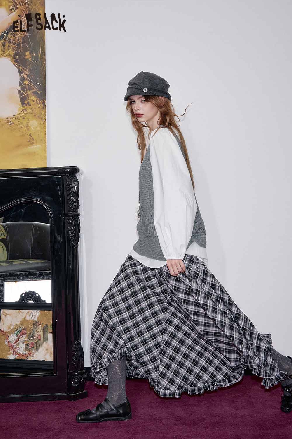 Fashionable ELFSACK linen blend vest set for women styled with a flowy plaid skirt and cap