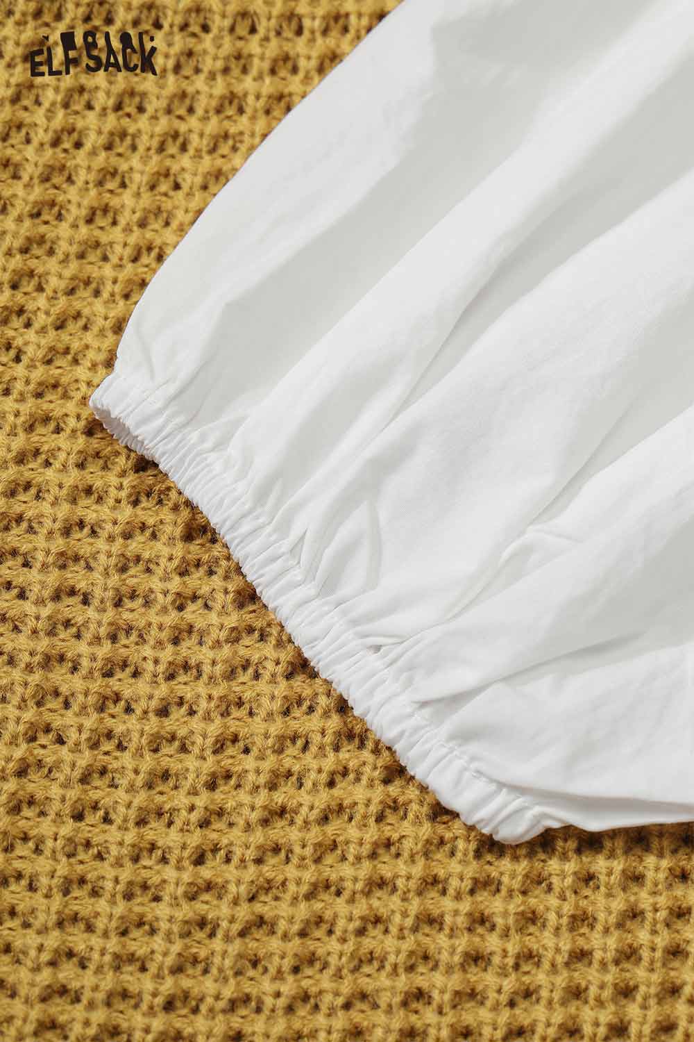 ELFSACK Linen Blend Vest Set for Women featuring a white top detail with elastic hem on a textured background