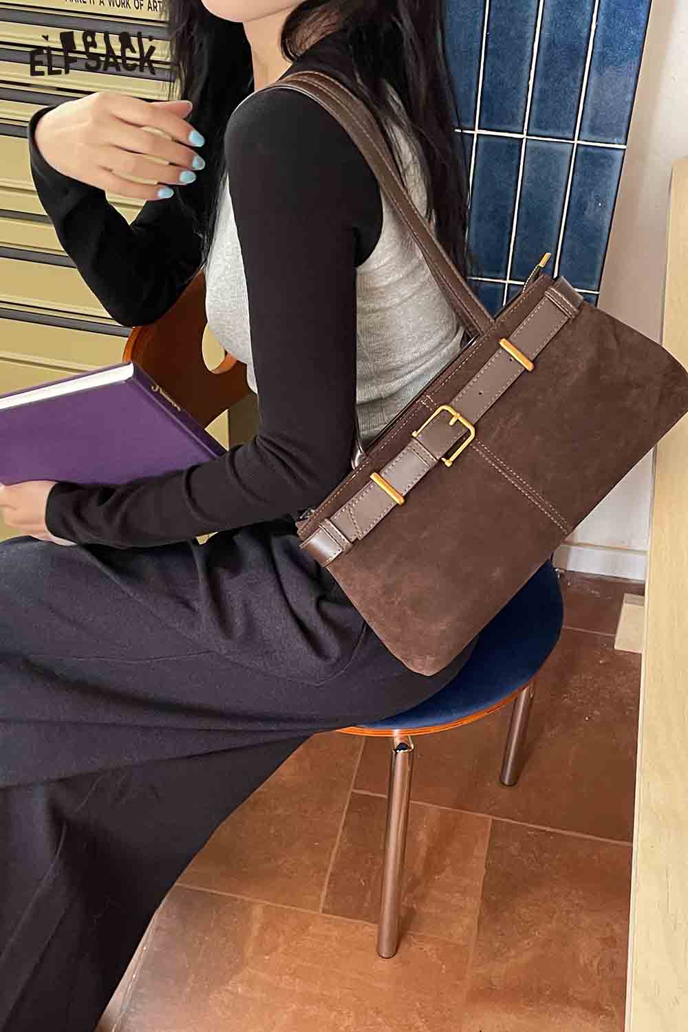 Stylish ELFSACK microsuede crossbody bag with a chic buckle design and versatile straps