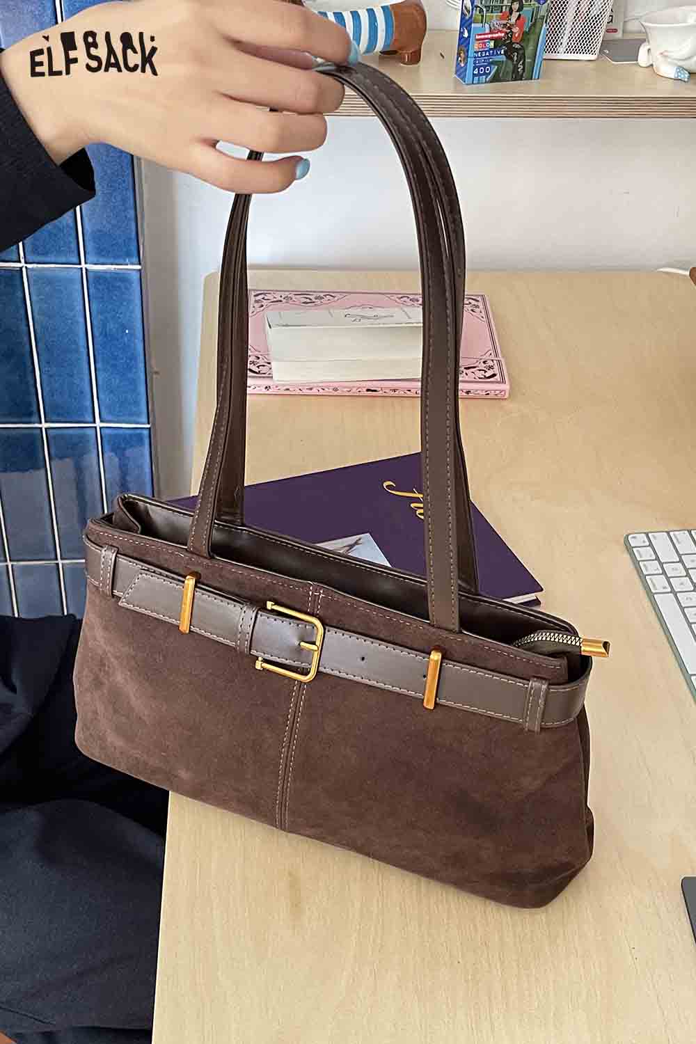 Stylish ELFSACK microsuede crossbody bag with a sleek design and adjustable straps