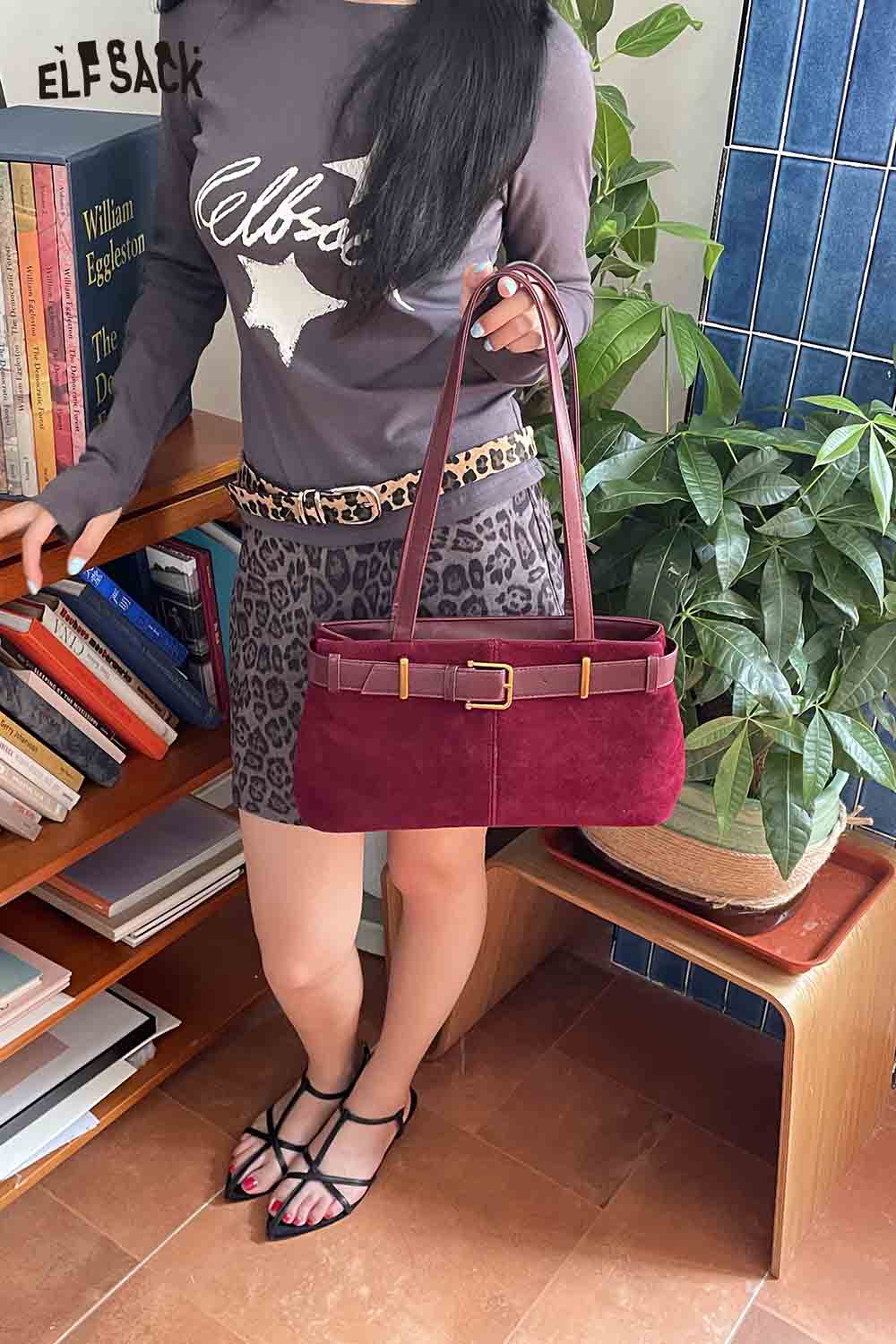 ELFSACK microsuede crossbody bag in burgundy paired with a stylish outfit for casual outings