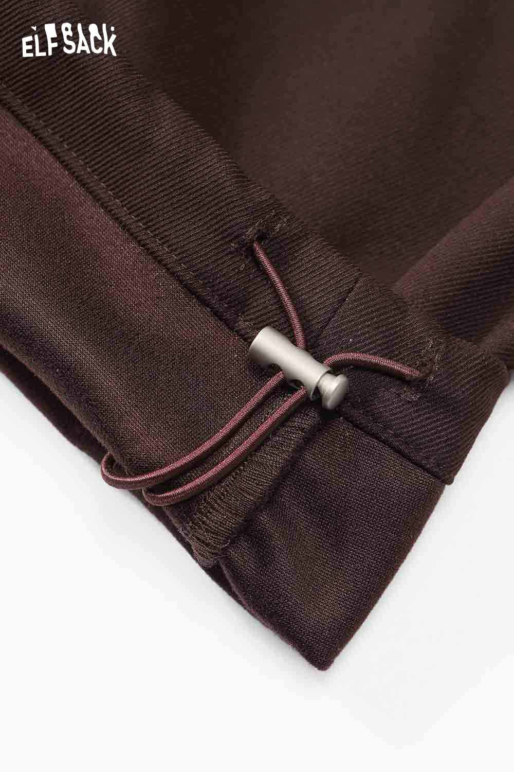 Close-up of ELFSACK minimalist cargo pants for women featuring adjustable drawstring detail