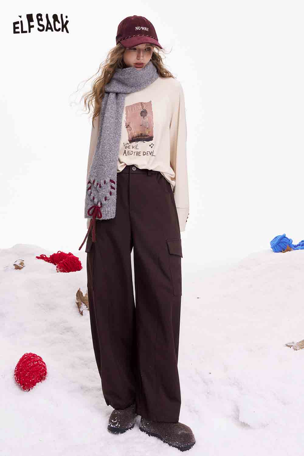 ELFSACK minimalist cargo pants for women in dark brown, styled with a cozy sweater and scarf