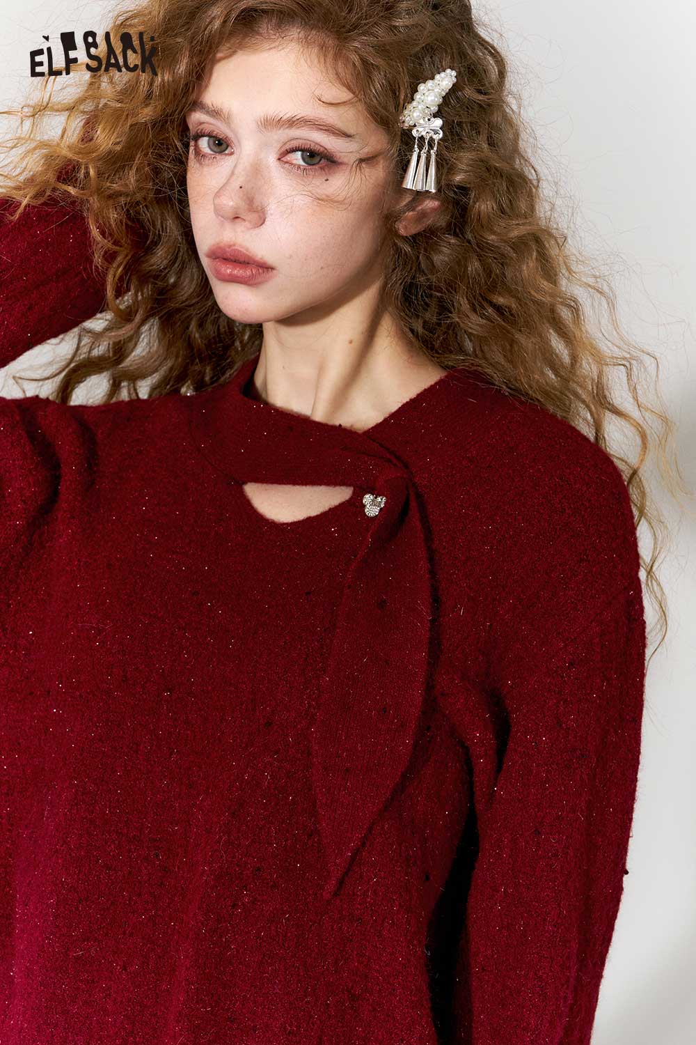 ELFSACK minimalist cropped sparkle sweater in burgundy with a unique bow detail and sparkling accents