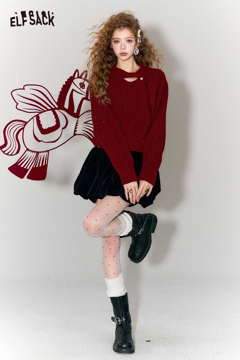 ELFSACK minimalist cropped sparkle sweater in burgundy, styled with a black skirt and knee-high socks