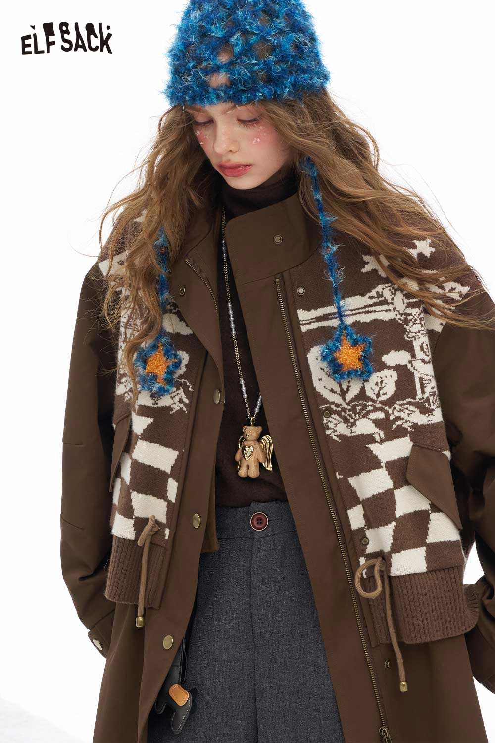 ELFSACK minimalist knit long coat for women styled with a colorful knit hat and layered for a chic look