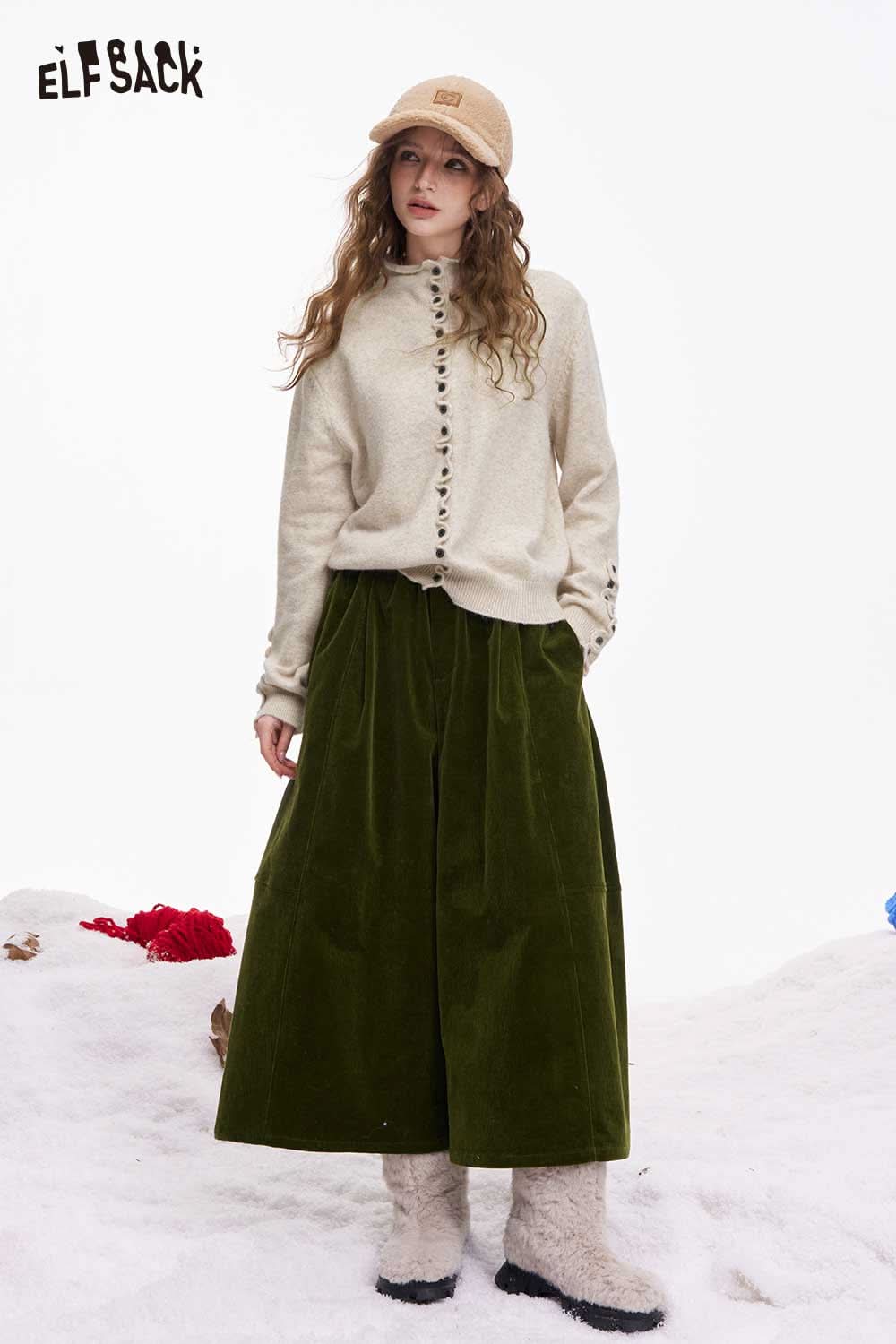 ELFSACK minimalist ruffle button knitwear in beige with a casual fit, paired with an olive green skirt