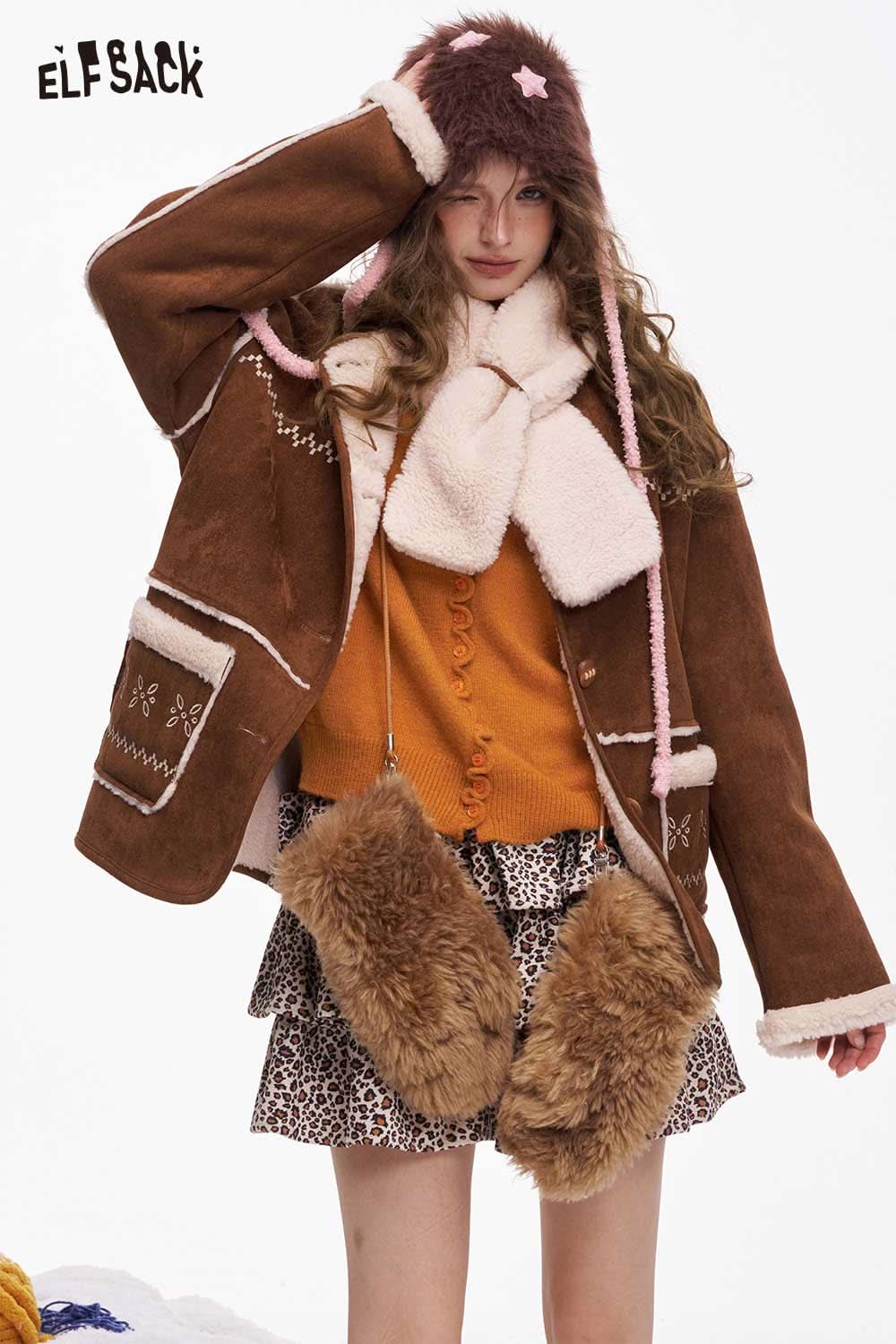 ELFSACK minimalist ruffle button knitwear showcased with stylish outerwear and playful accessories